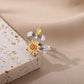 Anillo antiestres Stella Plata sobre placa de mármol